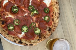 Honey Bee Pizza with a Craft Beer